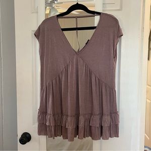 Brand new!! Purple top with shirt sleeves, flowy. Size medium